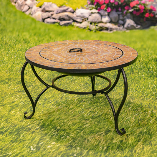 Round garden table with mosaic top on grass