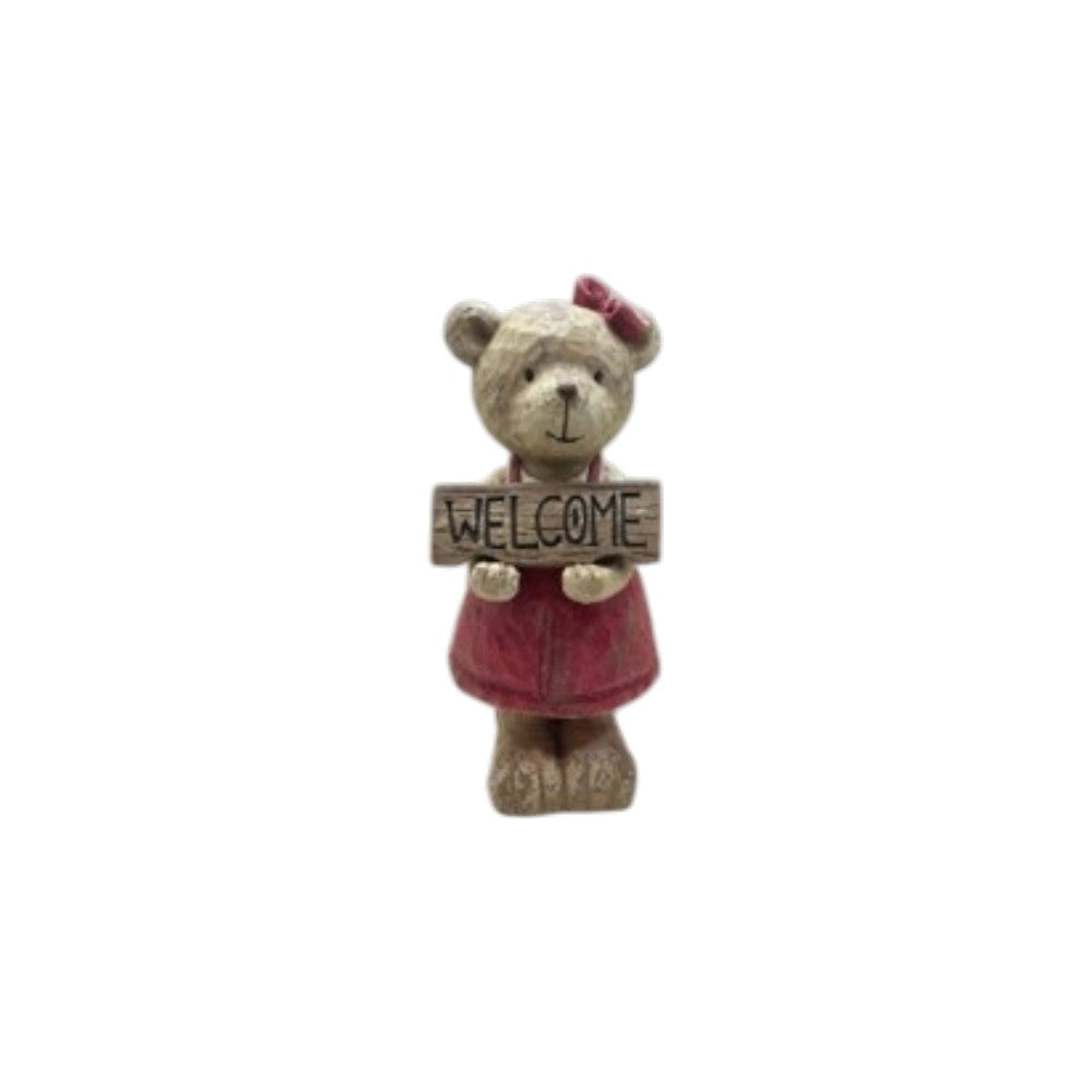 Little girl teddy bear with red dress holding welcome sign