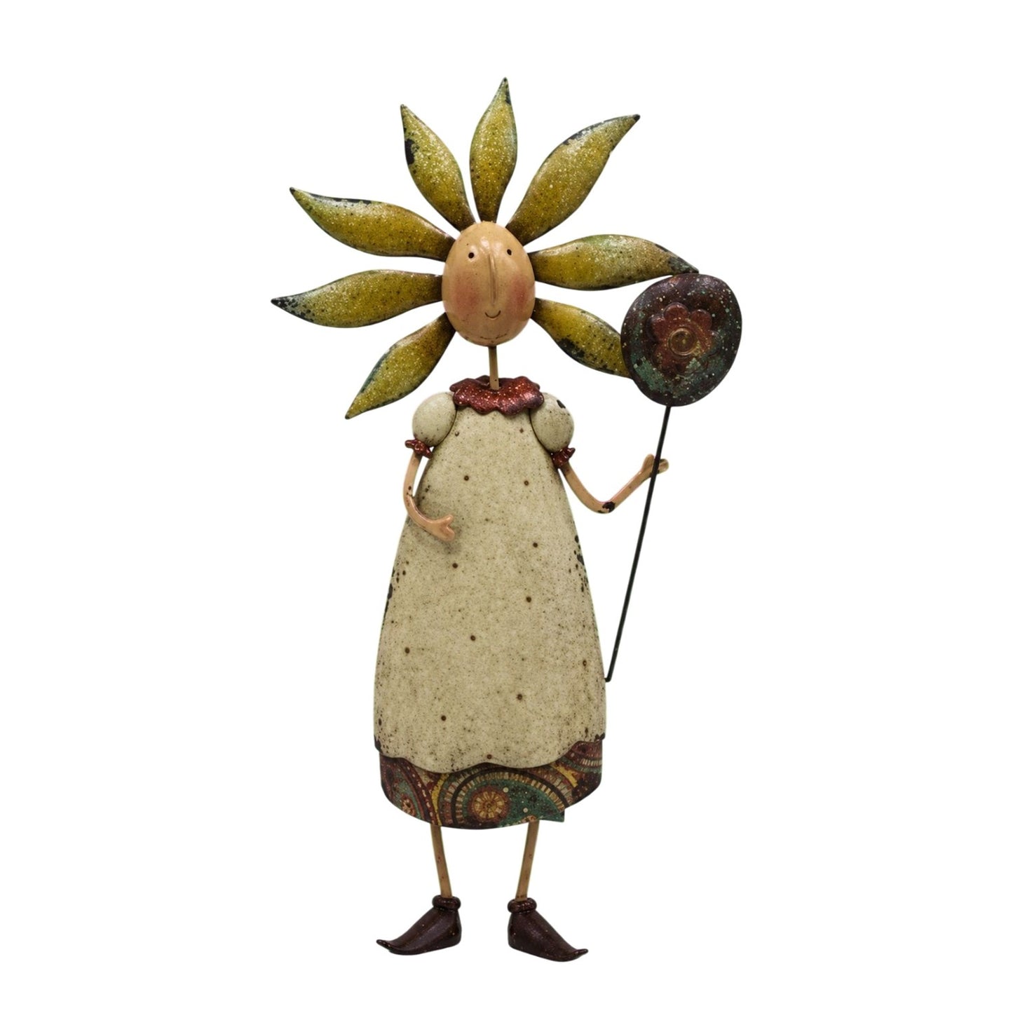 A rustic folk art decorative figurine of a sunflower-like character with a textured cream dress, patterned skirt, and a large yellow-green sunflower head, holding a round flower on a stick against a white background.