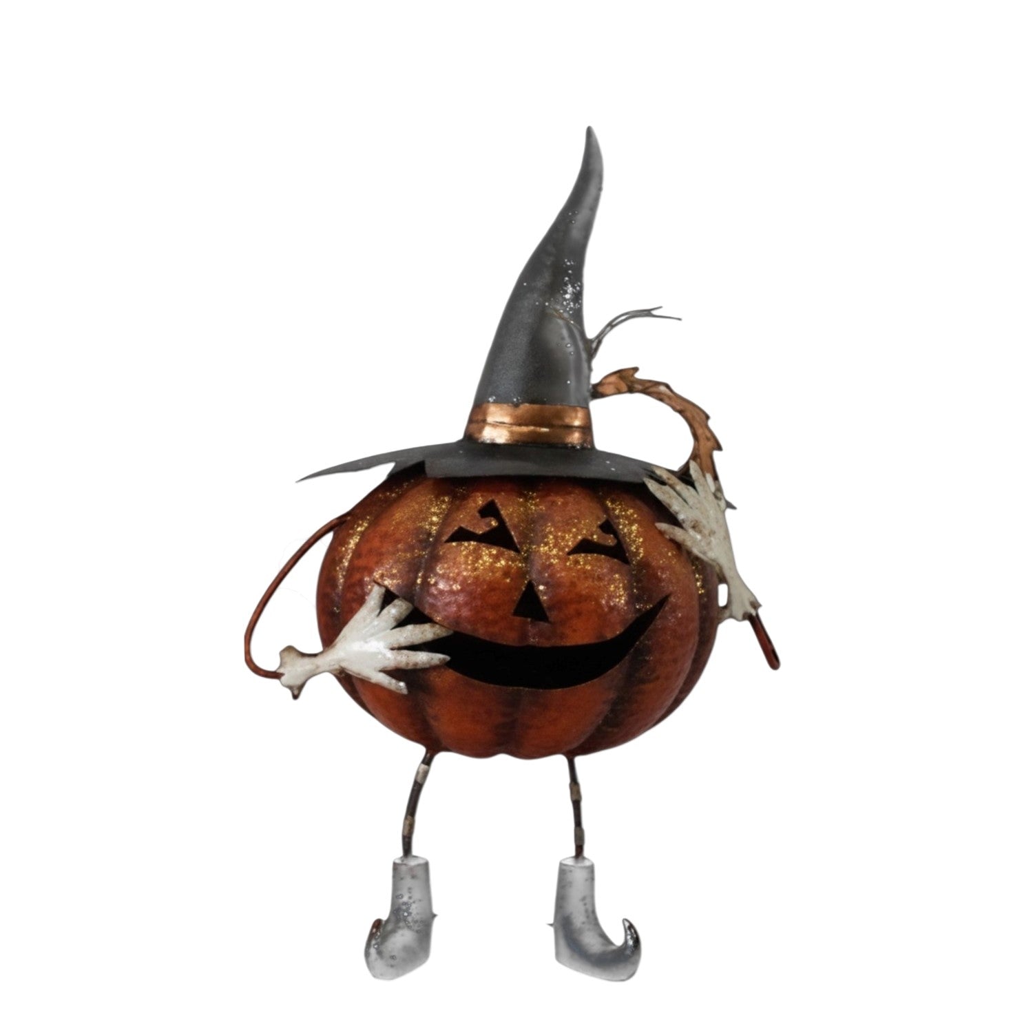 A Halloween decorative pumpkin figurine with a carved jack-o'-lantern face, wearing a pointed witch hat, skeletal hands, and silver shoes, isolated on a white background.