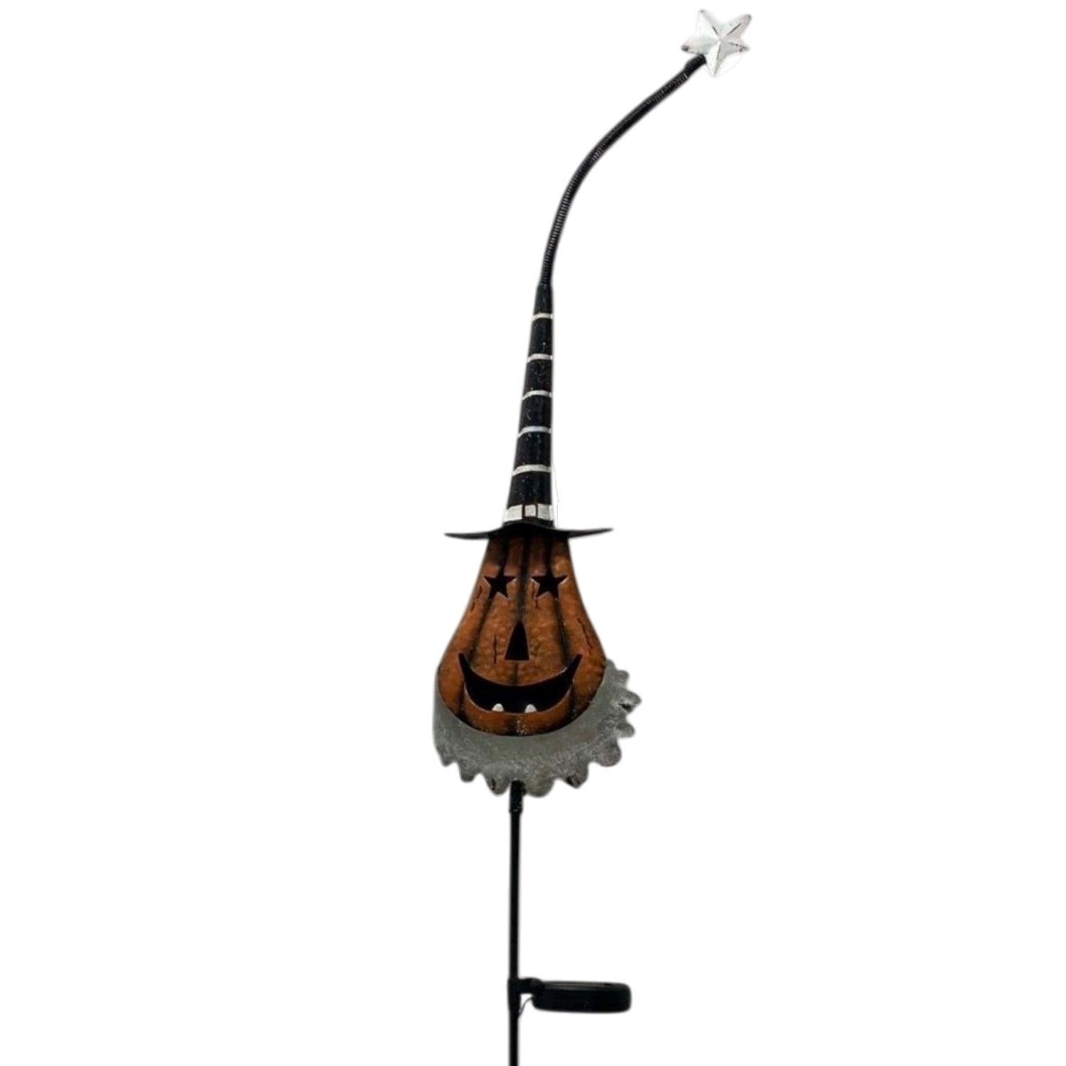 A Halloween garden stake shaped like a witch's broom, featuring a carved orange pumpkin head with a black handle, black bristles, and a silver-gray brim, topped with a small white star.